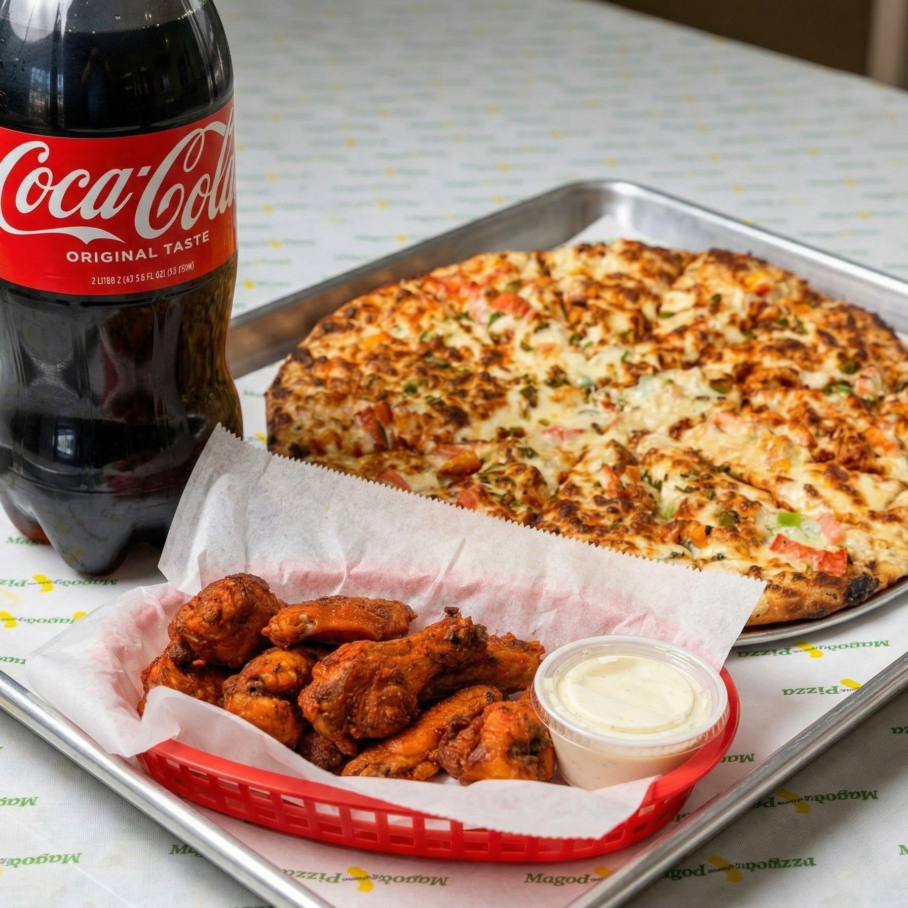Large Specialty Pie, 8 Wings & 2-Liter Soda Special.